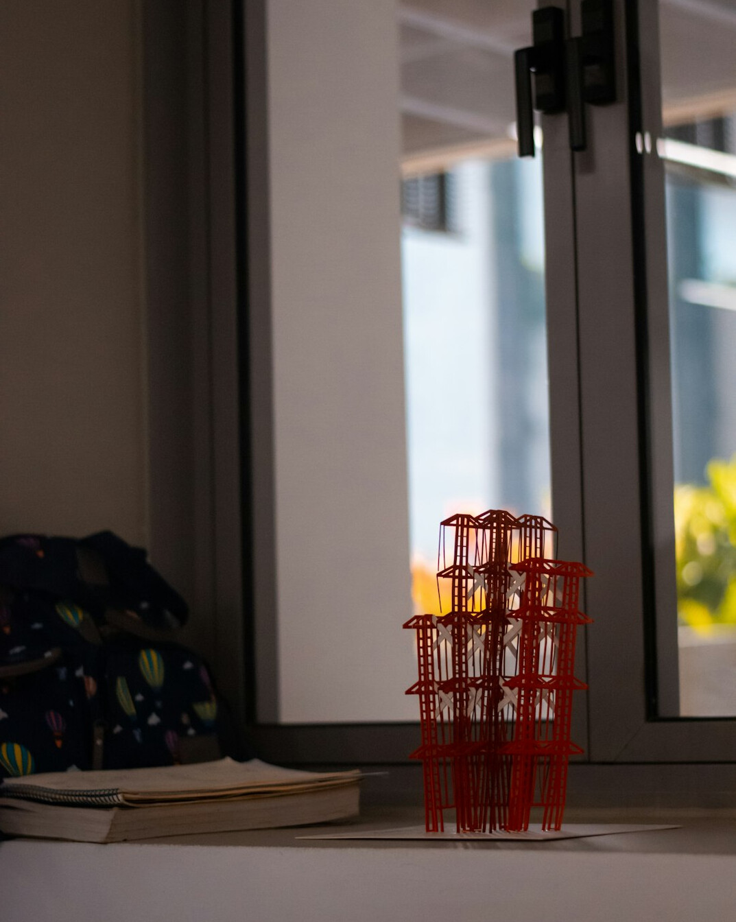 Anatomical spine model on a desk in a classroom